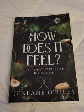 How Does It Feel? Paperback Book - Dark Green & Black Cover